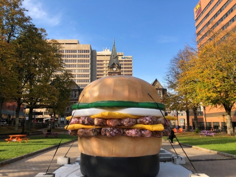 giant inflatable hamburger sitting in grand parade in halifax