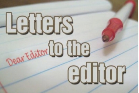 A pen and a paper with the words letter to the editor on it 