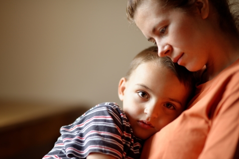 A women holding a young boy