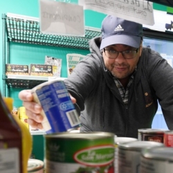 Michael Davies-Cole, manager of the DSU Food Bank, says shelves are cleaned out before the next shipment arrives (Danny Abriel photo) Michael Davies-Cole, manager of the DSU Food Bank