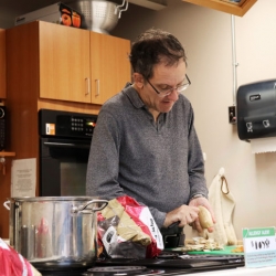 Man chopping vegetables