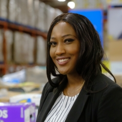 woman standing in warehouse