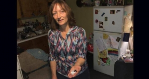 Dianne Crosby standing in her kitchen