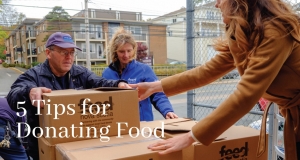 Boxes of food being loaded onto a dock