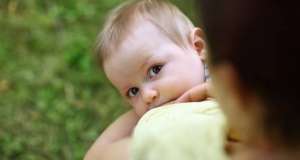 Woman breastfeeding a child