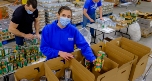 Carly packing food boxes