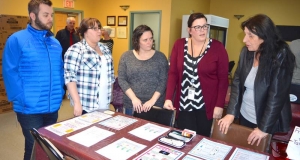 Ally Centre and Glace Bay Food Bank staff talk with DCS employees