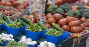 vegetable display in grocery produce aisle