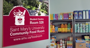 A door opening to the SMU community food room