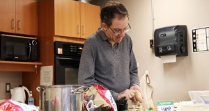 Man chopping vegetables