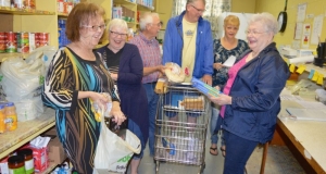 New Waterford food bank volunteers preparing a food order
