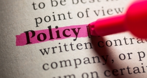 Words on a textbook page with the word policy highlighted