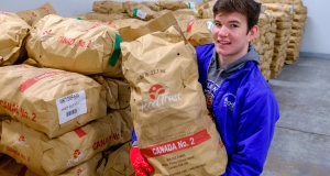 Scott in the warehouse with potatoes