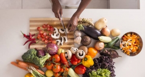 colourful produce on a wooden chopping board