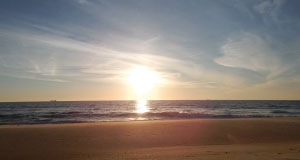 sun setting over the ocean